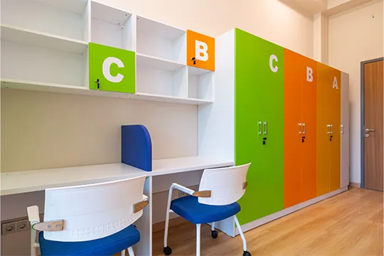 study desks and student lockers in the student dormitory